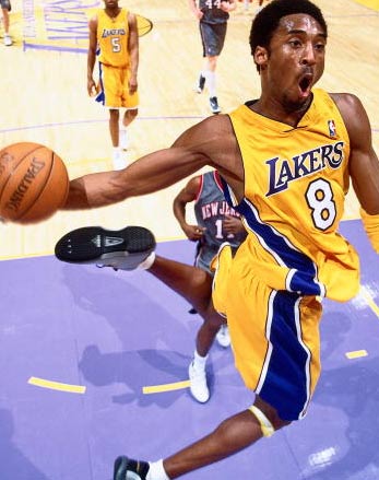 kobe bryant dunks on. Posted by James A. Brown on